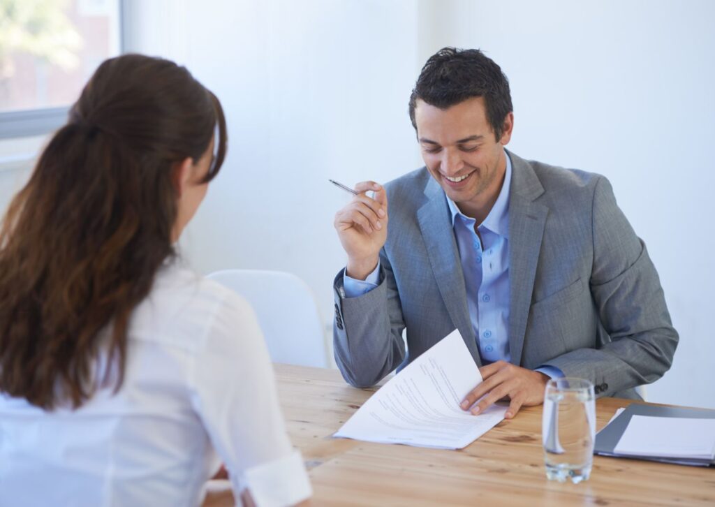 man interviewing woman