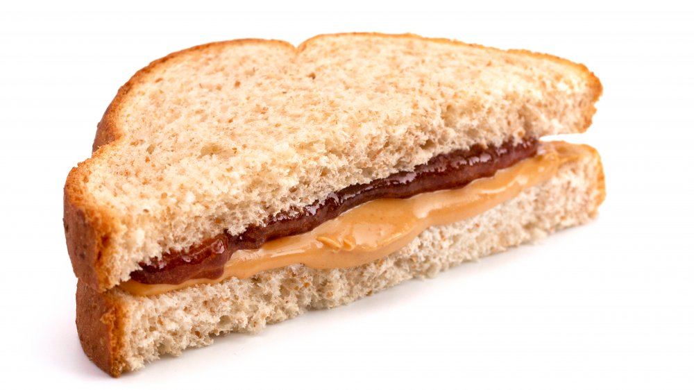 peanut butter and blackcurrant jam sandwich