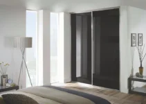 Dramatic Flair: Slimline Framed Sliding Wardrobe Doors with Black Glass Finish