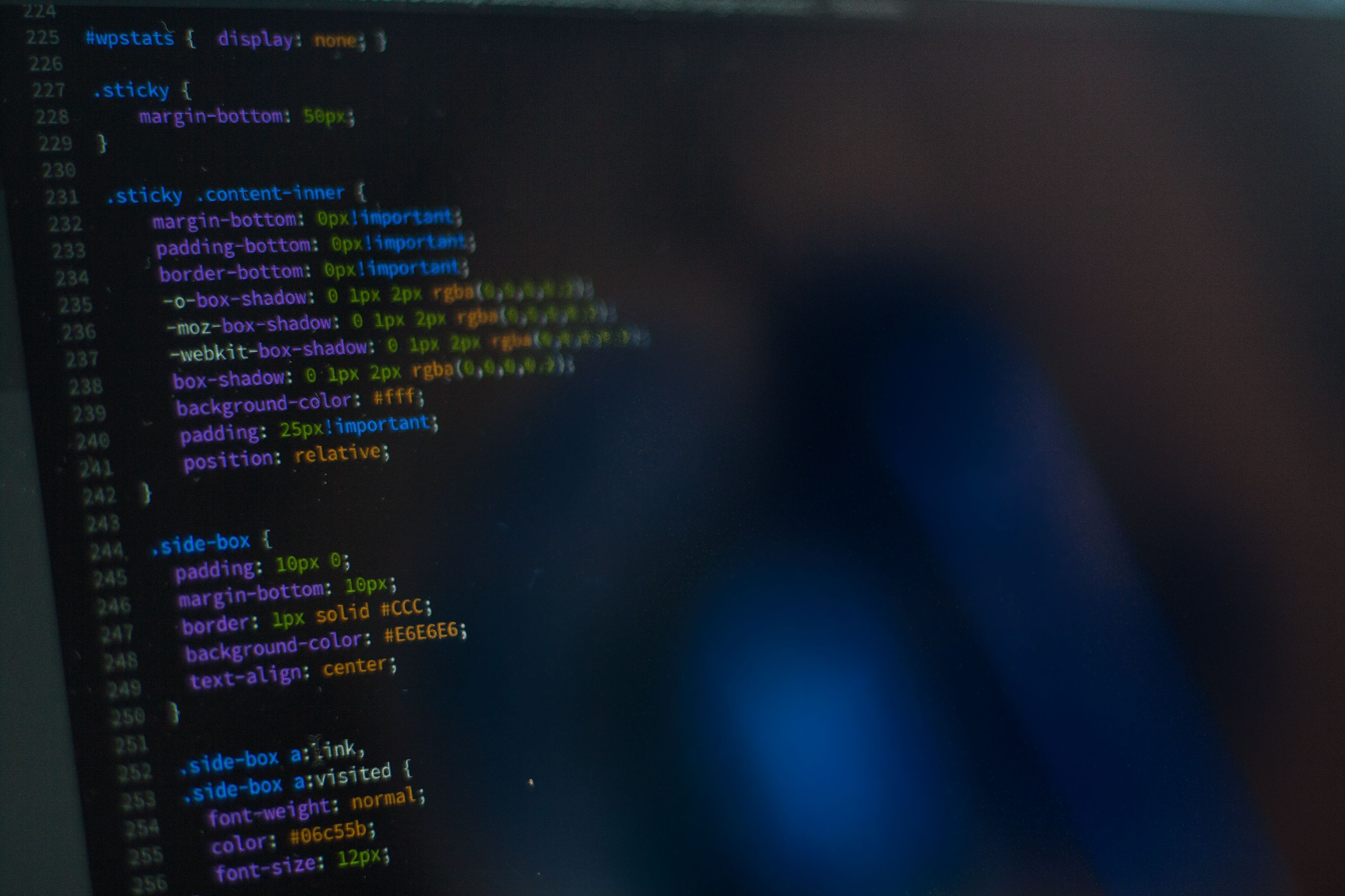 Close-up of CSS code on a monitor, representing the frontend changes checked by visual tests.